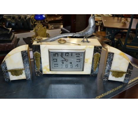 An Art Deco marble and spelter clock garniture, the rectangular silvered face with Arabic numerals, surmounted with a pheasan