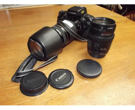 Canon E0S 750 camera with two lenses, EF75-300mm and EF35-105mm, with soft case
