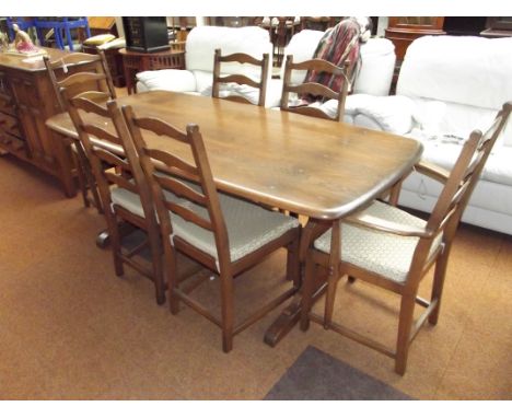 Ercol Old Colonial dining table with six ladder back chairs 