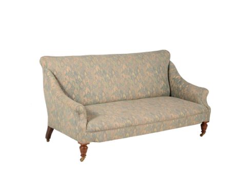 A Victorian mahogany and upholstered sofa, in the manner of Howard & Sons, late 19th century, the castors stamped 'Hampton & 