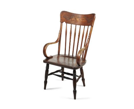 A stick armchair in Windsor style, first half 19th century, the bar back with incised scroll decoration above the bentwood ar