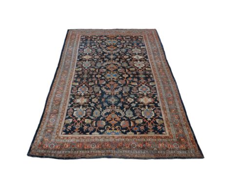 A Ziegler Mahal carpet, the dark field decorated with an overall design of meandering foliage incorporating flowerheads and p