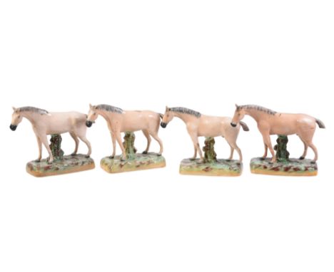 A group of similar Staffordshire pottery models of four dun horses of William Kent Ltd. type, first half 20th century, circa 