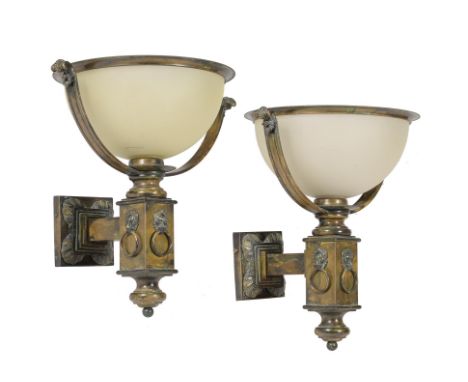A pair of gilt and brushed metal and frosted glass wall lights, 20th century, each dished shade descending to rectangular arm