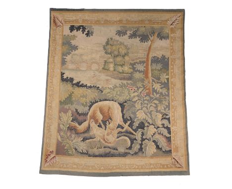 A French landscape tapestry panel, later 19th century, in 17th century taste, with a fox attacking a hare before a wooded bac