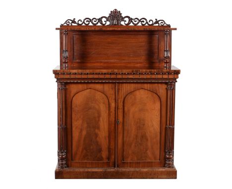 A William IV mahogany side cabinet, circa 1835, in the manner of Gillows, the superstructure above a pair of cupboard doors e