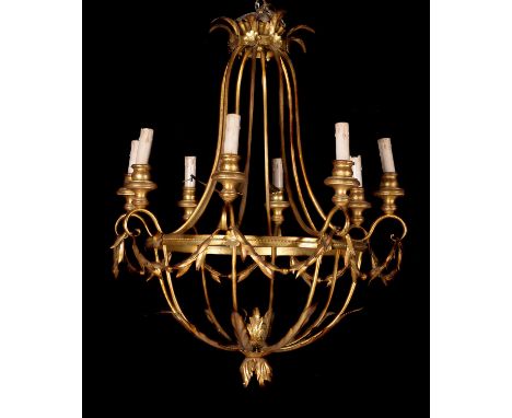 A gilt metal eight light chandelier, modern, of cage form, the circlet issuing scrolled branches and suspending swags, 77cm h