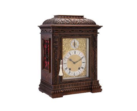 A Renaissance Revival carved walnut mantel clock, Lenzkirch, with ting-tang gong striking movement signed to the backplate fo