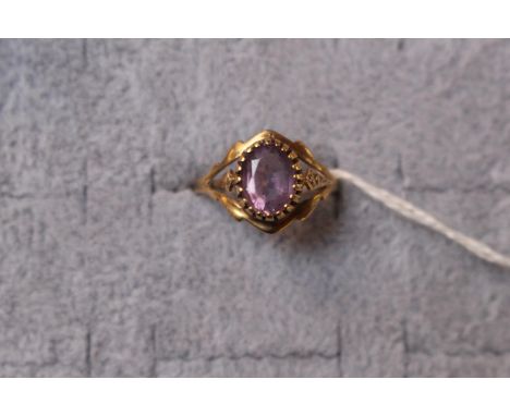 Ladies 9ct Gold Oval Amethyst rub over set dress ring 1.8g total weight 