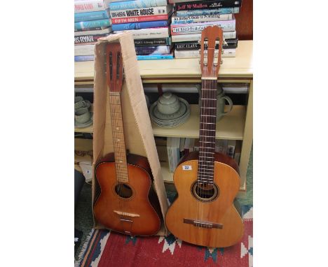 B M Espana Classical Acoustic Guitar and another 