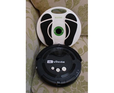 Vileda Robot Vacuum and a Revitive Foot circulation machine 