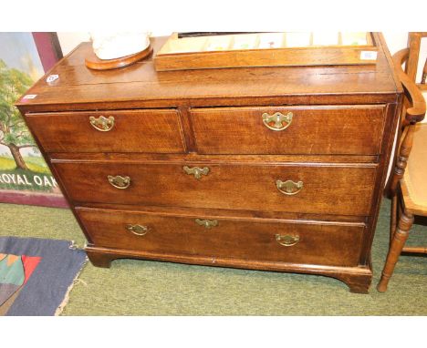 Georgian chest of 2 over 2 drawers with brass drop handles over bracket feet 