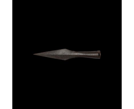 9th-11th century AD. A large iron spearhead with lozengiform blade, long shoulders with rectangular plaques below, flared soc