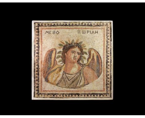 1st century BC-2nd century AD. A large rectangular mosaic floor panel in original matrix, with castellated bichrome border an