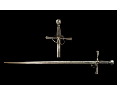 Circa 1500-1540 AD. A 'hand and a half' or 'Bastard' sword, with ring guard, double-edged broad blade, lenticular in section,