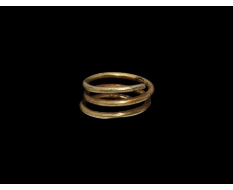 5th-3rd century BC. A gold coiled wire hair ring.   3.76 grams, 18mm (3/4"). Ex Manton collection, Birmingham, UK; acquired o