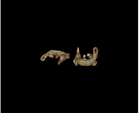 4th-2nd century BC. A sheet gold crocodile model with curved body and tail, hollow to the underside.   3.08 grams, 44cm (1 3/