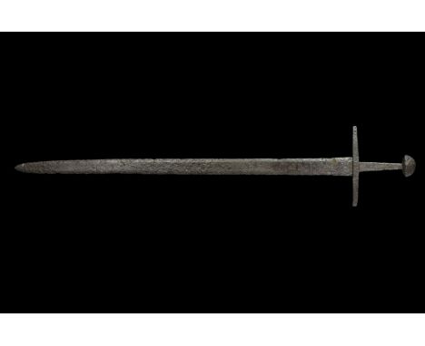 10th - mid 11th century AD. An iron sword with narrow two-edged blade, gently tapering profile with shallow tip, no appreciab