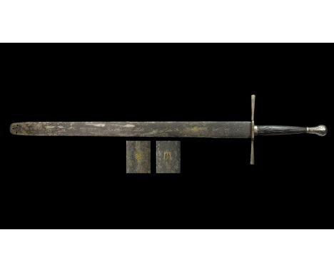 Late 17th century AD. A long Western two-handed executioner sword of German making; the pear-shaped pommel is mounted on the 