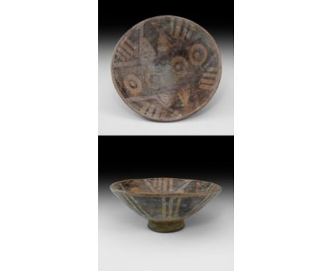 Tuncahuan Period, 5th century BC-5th century AD. A ceramic footed bowl with conical body and flared foot, painted polychrome 