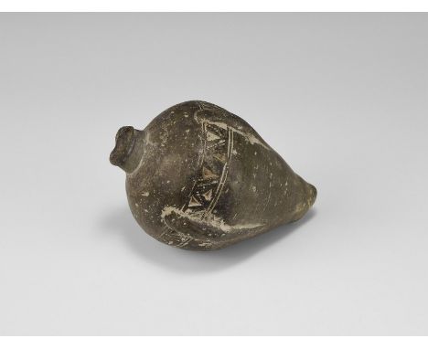 9th-11th century AD. A hollow ceramic vessel with domed top and conical base, intended to be filled with explosive liquid and