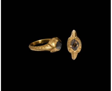 Later 16th century AD. A natural diamond crystal set with square table facet uppermost in an Elizabethan era gold finger ring