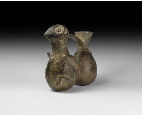Chimu Period, 9th-15th century AD. A ceramic jar or ewer formed as two connected bulbs, one with applied wing and leg detaili