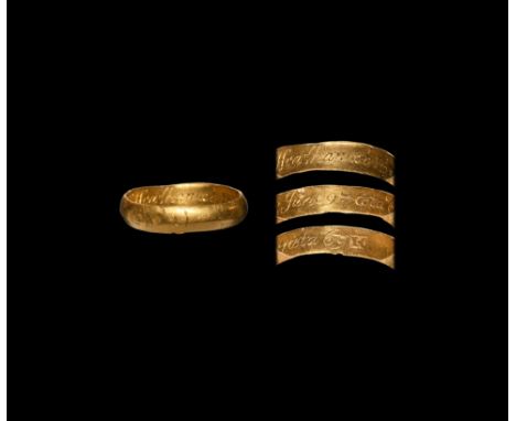 Dated 1697 AD. A gold 'memento mori' finger ring with keeled profile, low-relief skull to the outer face, italic inscription 