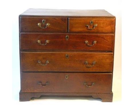 A mid 18th century and later oak caddy top chest of drawers, the moulded top over an arrangement of two over three graduated 