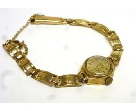 A 9ct yellow gold ladies wristwatch by Rotary on an articulated bracelet strap, with original box CONDITION REPORT: Currently