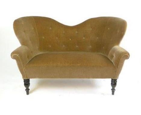 A 19th century and later camel-back two seater button upholstered sofa on turned legs CONDITION REPORT: Good, will require re