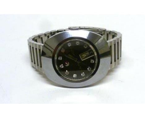 A gentleman's stainless steel cased 'Dia Star' wristwatch by Rado, the circular dial with clear stone hour markers and date a