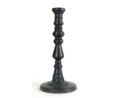 A Victorian black slate turned candlestick, h. 37 cm