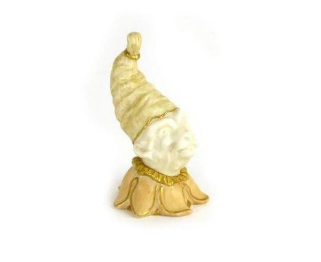 An early 19th century Royal China Works Grainger & Company  Worcester blush ivory candle snuffer modelled as a monkey's head 