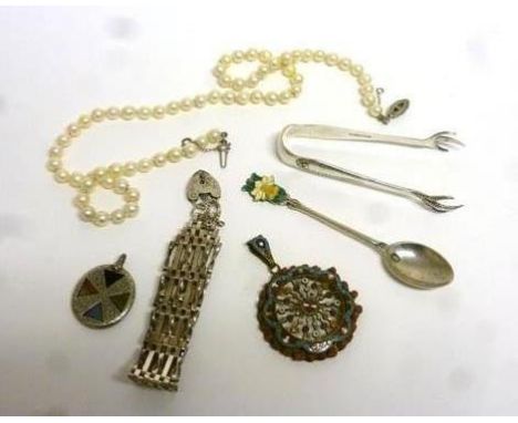 A small parcel consisting a silver gatelink bracelet with padlock clasp, a silver and enamelled spoon with daffodil finial, a