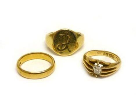 An 18ct yellow gold signet ring, ring size N/O, 13.8 gms, a 22ct yellow gold wedding band, ring size J, 4.7 gms and an 18ct y