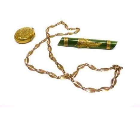 A 9ct yellow gold mounted green jade bar brooch, w. 5.6 cm, a yellow metal leaf-link necklace and a yellow metal florally eng
