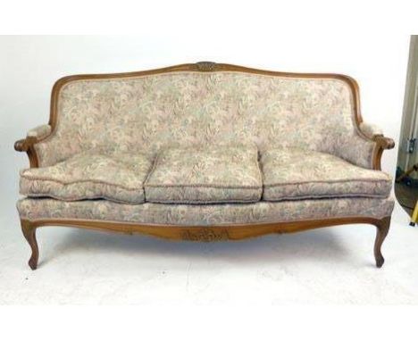 A French-style beech framed three seater sofa in floral upholstery, h. 92 cm, w. 170 cm CONDITION REPORT: Good, presumably mi