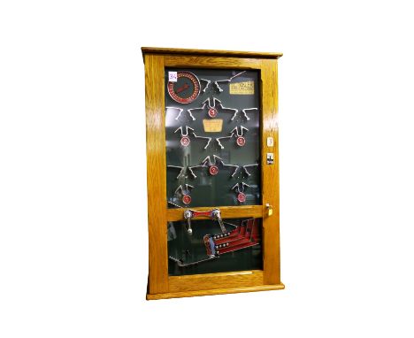 Bryans Works Trickler 1933 Skill Catching Game. The Trickler is a large ball catching machine designed by W.E Bryan of the Br