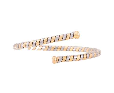 BULGARI Armspange, 18K Gelbgold mit Edelstahl, 20,1 gr, Innenumfang ca. 17 cm (flexibel), 21. Jh., leichte bis mäßige Tragesp