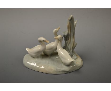 A Lladro model group of three geese