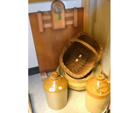 A stoneware salt glazed flagon, Beard Gresley; another Davenport wine and spirits; a wicker basket; an Art Deco fire screen; 