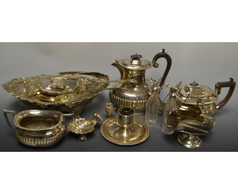 An E.P.N.S three piece half-fluted tea service; a pair of King's pattern basting spoons; a sugar scuttle; a pair of oil bottl