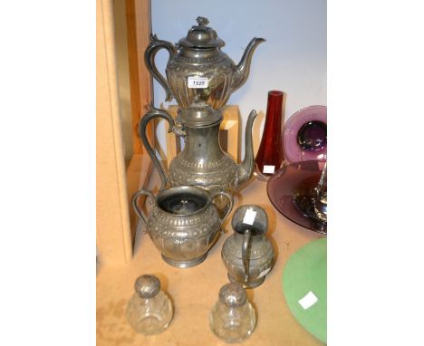 A pair of Victorian hobnail cut scent bottles, silver embossed covers; an EPBM four piece tea service (6)