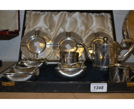 A Don Pewter drawing-room suite, comprising ashtrays (3) and bonbon dishes (3), planished throughout, cased en suite; a silve