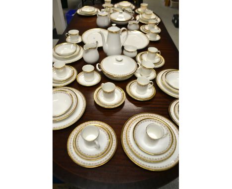 A Staffordshire Elizabethan China, Clifton pattern dinner service, comprising a pair of tureens, tea pot, coffee pot, pair of