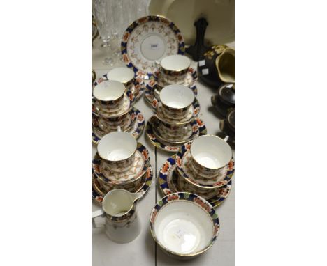 An Edwardian twelve setting tea service, decorated with flowers 