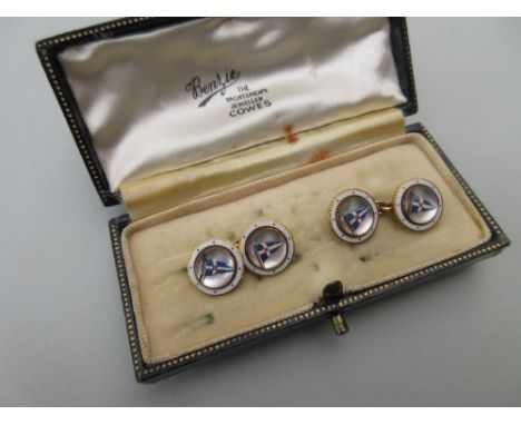 A pair of enamelled cufflinks by Benzie of Cowes set with 'Essex crystals' depicting RTYC burgees, each of the double-ended l