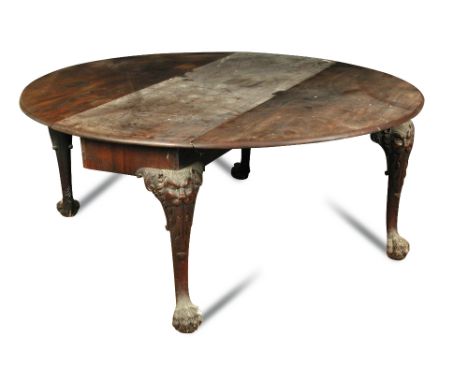 A George II Irish mahogany table, on carved lion mask and foliate carved cabriole legs and hairy paw feet 73 x 167 x 173cm (2