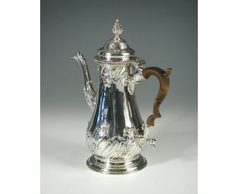 George III silver coffee pot, maker J G, London 1765, of baluster form, embossed decoration to either end of the body, the hi